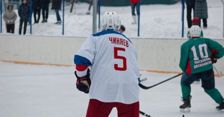 Legendary Players - A man in a red and white uniform playing hockey