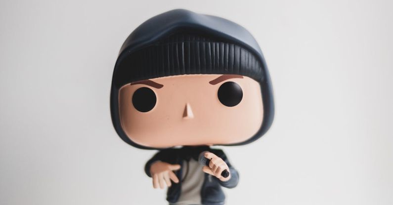 Game Update - Full length of collectible little figurine of character of film wearing jeans and hoodie