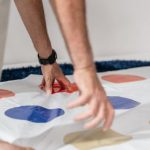 Gaming Skills - Two People Standing on a Gaming Mat